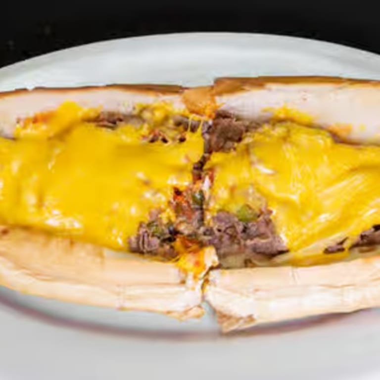 Indulge in Our Cheesesteak